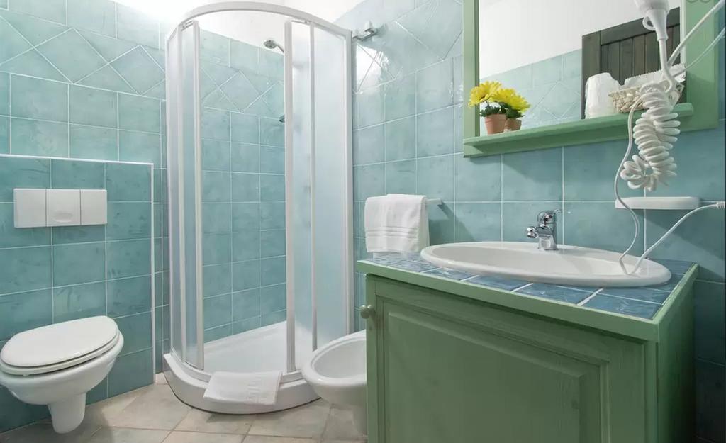 Appartamento Gli Ontani Cala Liberotto Habitación foto