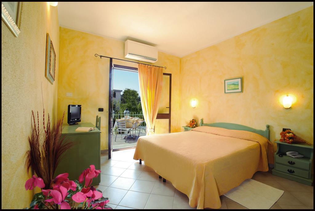 Appartamento Gli Ontani Cala Liberotto Habitación foto