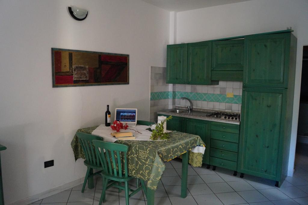Appartamento Gli Ontani Cala Liberotto Habitación foto